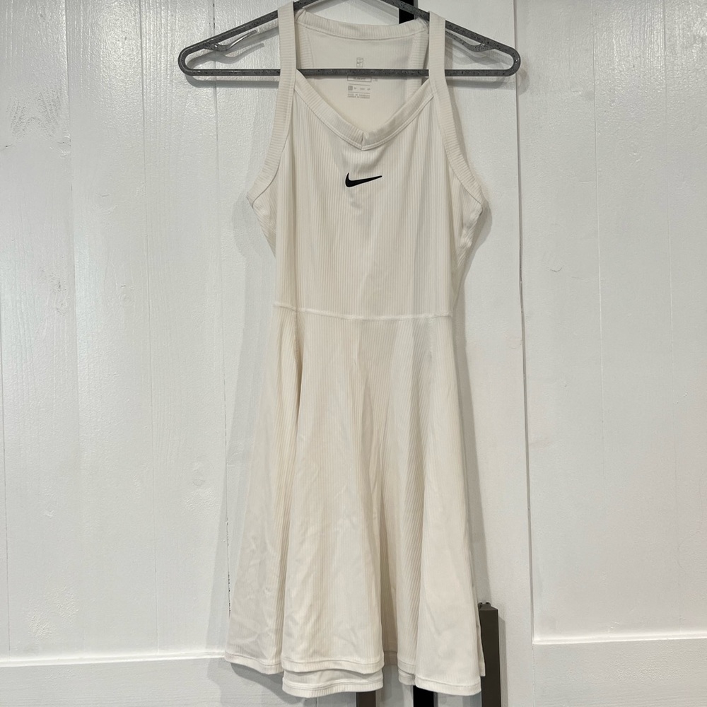 Nike tennis dress size multiple quantities in sizes S, M, and L